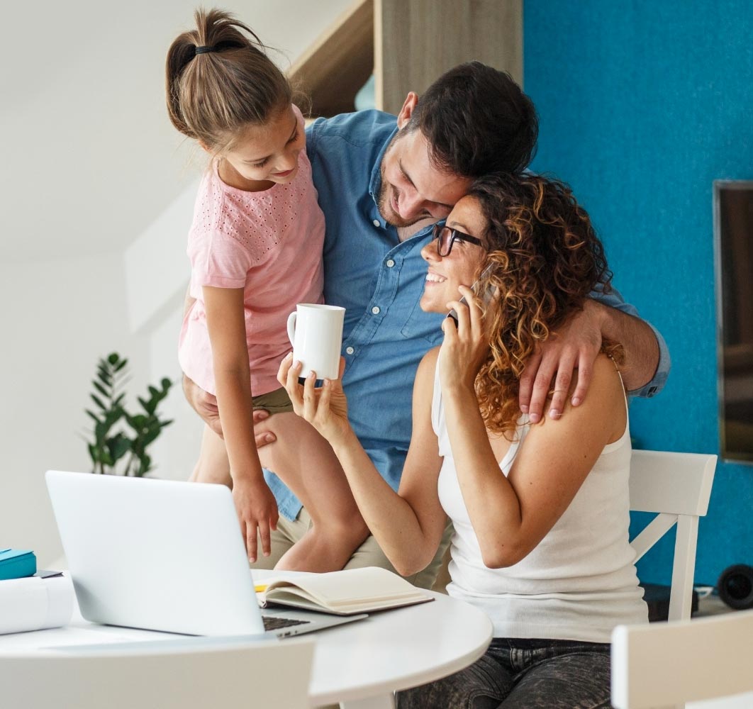 Family around a computer Family around a computer